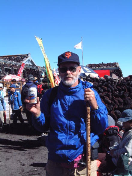Having a beer at the top of Mt. Fuji!